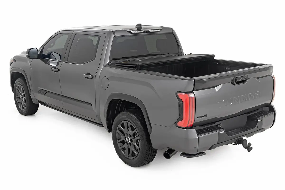 Rough Country Low Profile Tri Fold Aluminum Tonneau Cover For 2022-2024 Toyota Tundra (5' 7" Bed) 1